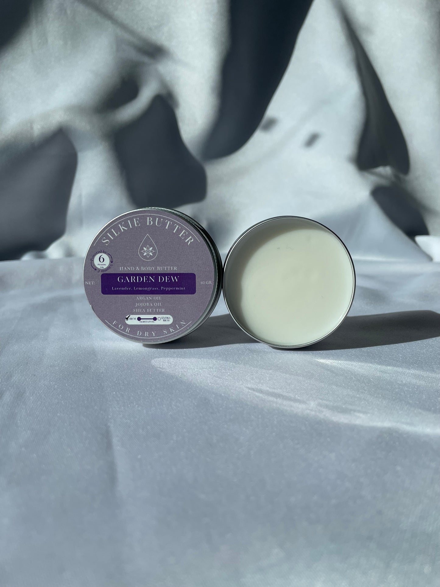 Garden Dew Body Butter for Dry Skin in a tin container