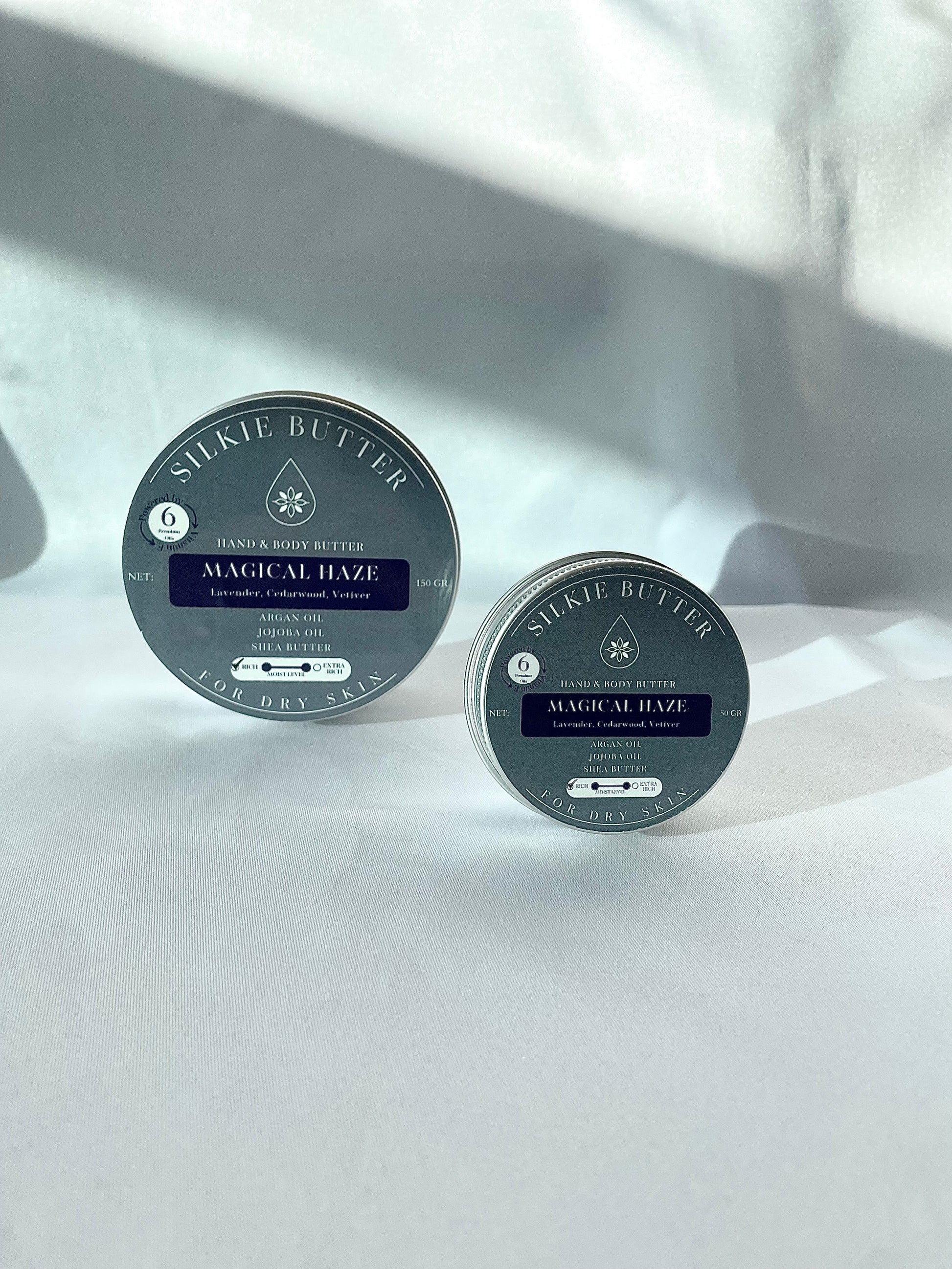 Two containers of Body Butter Magical Haze